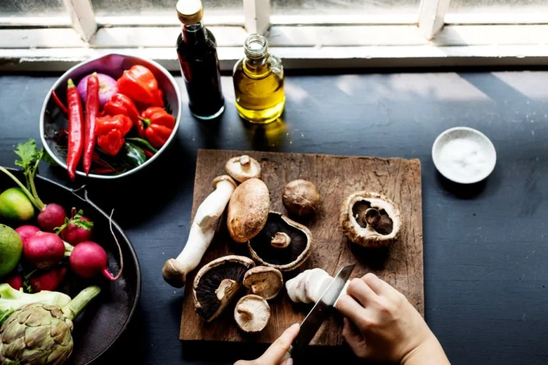 Hand cutting mushrooms for healthy aging